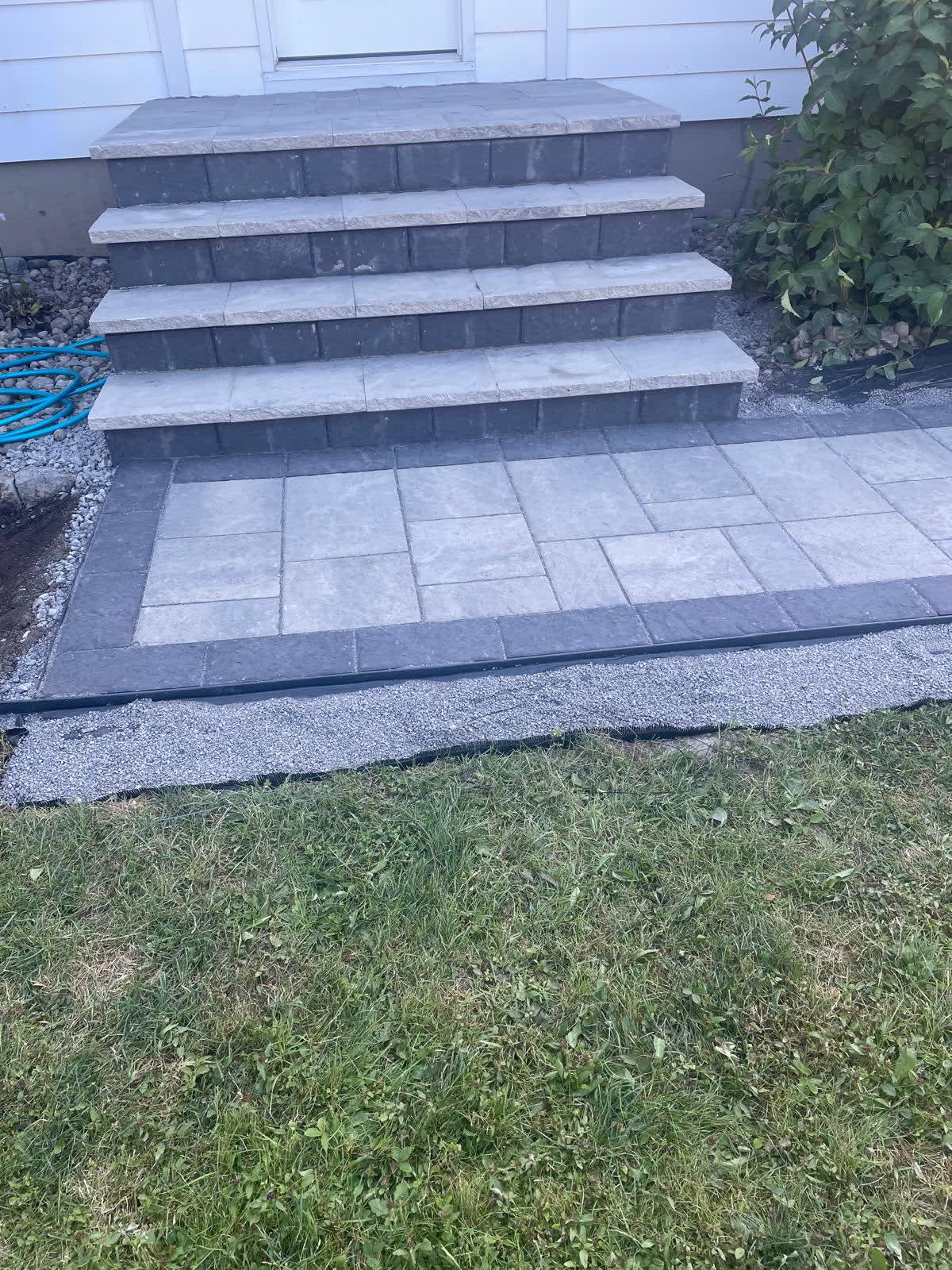 Natural stone front entrance steps and landing